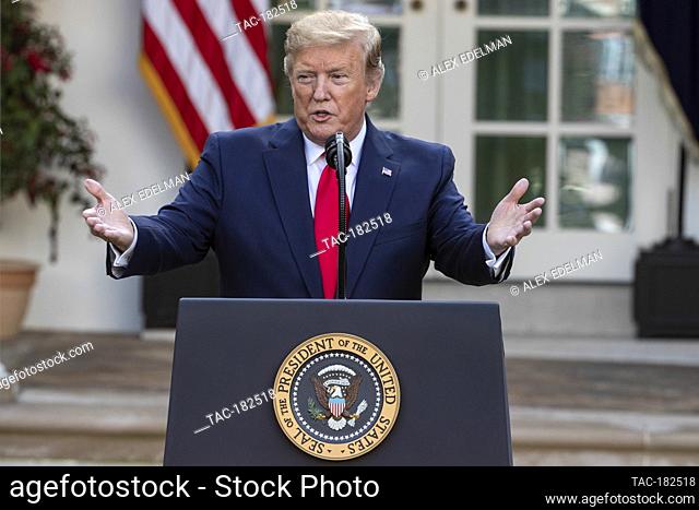 U.S. President Donald Trump delivers remarks before presenting the Presidential Medal of Freedom to Golfer Tiger Woods in the Rose Garden of the White House in...