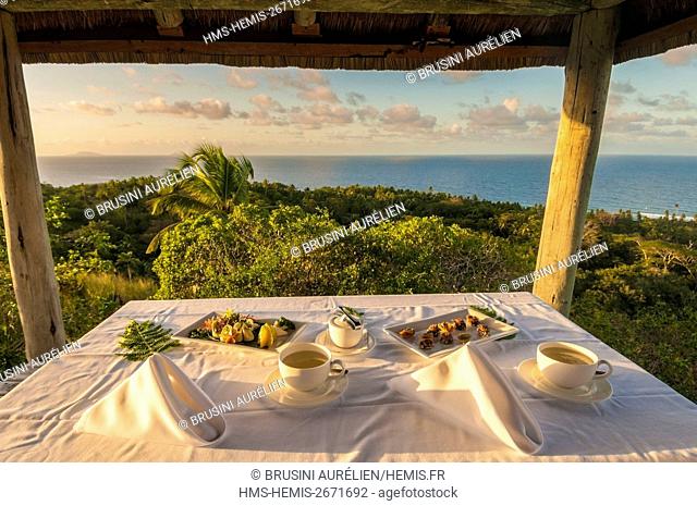 Seychelles, Fregate Island, Fregate Island Private, High Tea, panoramic promontory on a granite rock, table set for tea time