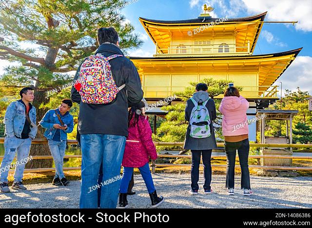KYOTO, JAPAN, JANUARY - 2019 - Tourists at famous kinkakuji zen temple at Kyoto city, japan