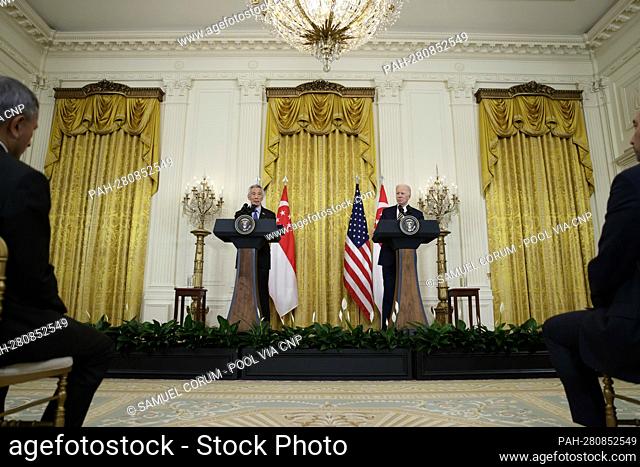 Lee Hsien Loong, Singapore's prime minister, speaks during a joint statement with U.S. President Joe Biden, right, in the East Room of the White House in...