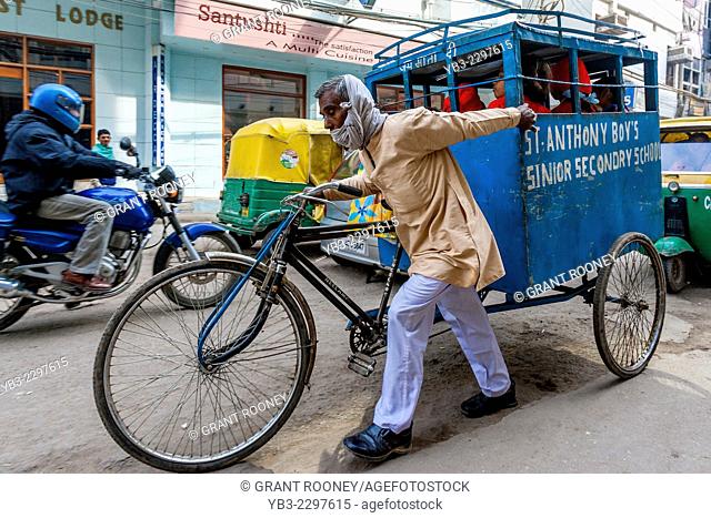 School Children Being Taken To School By Rickshaw Taxi, New Delhi, India