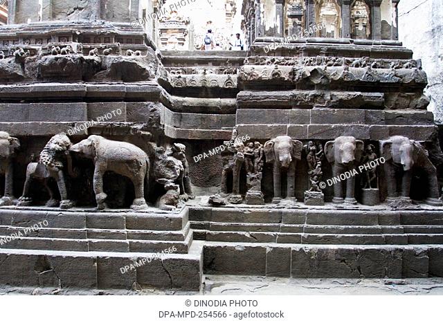 Elephant statue supporting kailash temple, aurangabad, maharashtra, india, asia
