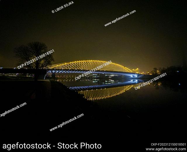 The Troja Bridge over the Vltava River, designed by Mott MacDonald and Koucky Architects, in the evening fog, in Prague, Czech Republic, on December 13, 2023