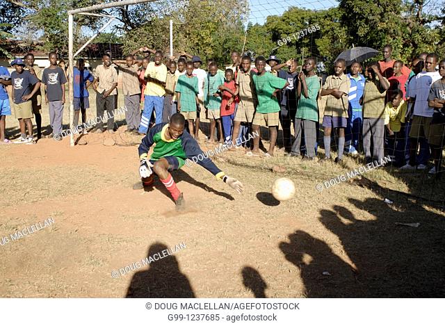 Zimbabwe, Mashonaland Central, Howard Institute. May 2010. Africa Day sports events at a boarding school. Goalie made the save this time