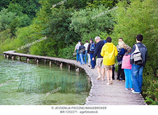Tourists on the path at Plitvicka Jezera, Plitvice Lakes National Park, Lika-Senj, Lika-Senj, Croatia, Europe