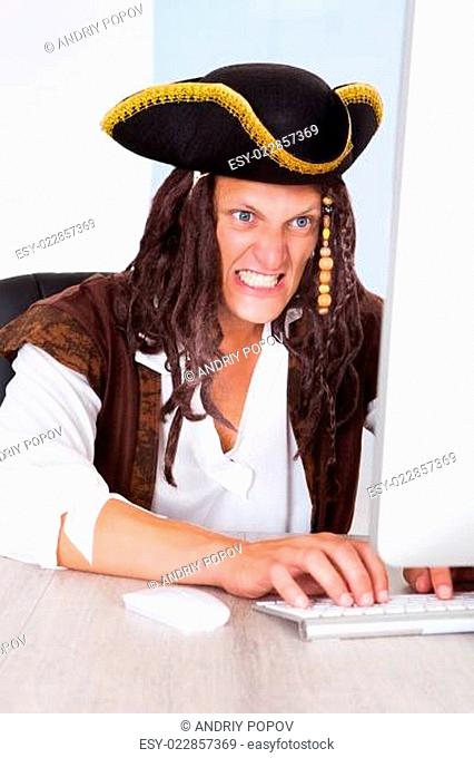 Angry Pirate Using Computer