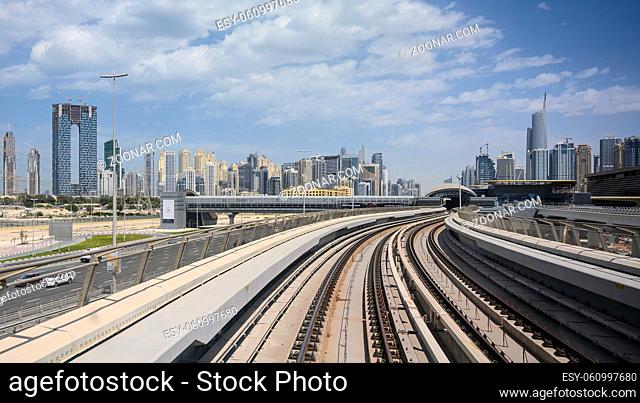 Dubai Metro Line along the Sheikh Zayed Road in the UAE. Clear Sunny day 15 March 2020