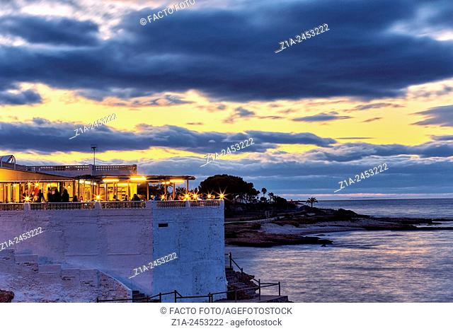 Beach bar by sunset at ""Las Rotas"" beach. Denia. Alicante. Valencia Community. Spain