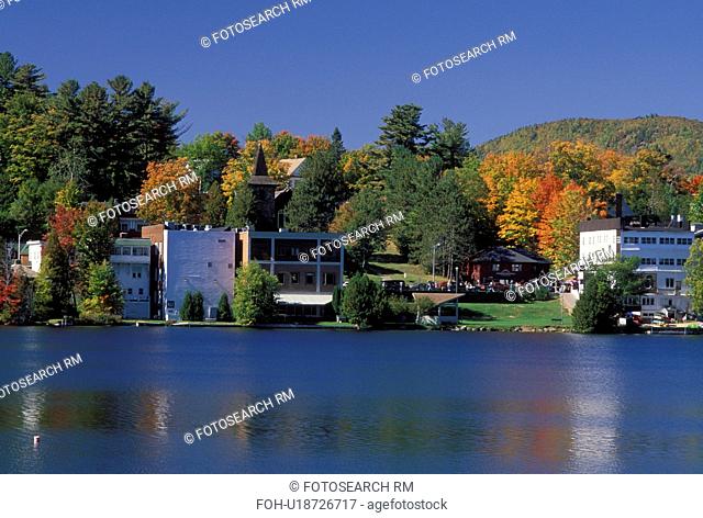 Lake Placid, NY, New York, The Adirondacks, Scenic view of the resort town of Lake Placid along Mirror Lake in the autumn