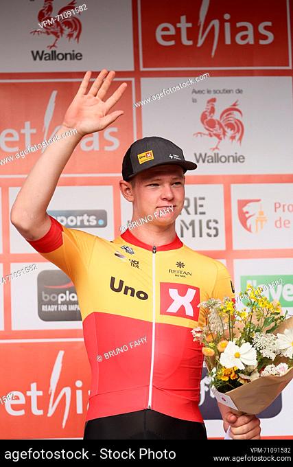 Norwegian Tord Gudmestad of Uno-X celebrates on the podium in the combativity jersey after stage 3 of the Tour De Wallonie cycling race