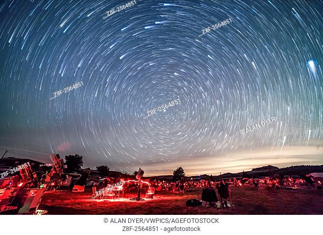 Circumpolar star trails over the upper field of the Texas Star Party, May 13, 2015. The star party attracts hundreds of avid stargazers to the Prude Ranch near...
