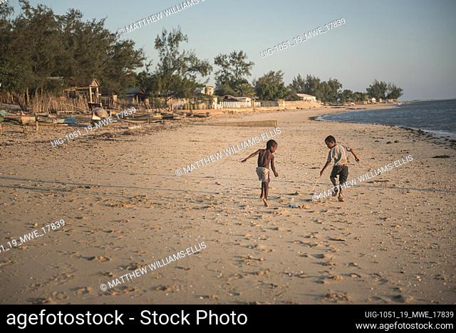 Children playing on Ifaty Beach at sunset, South West Madagascar, Africa