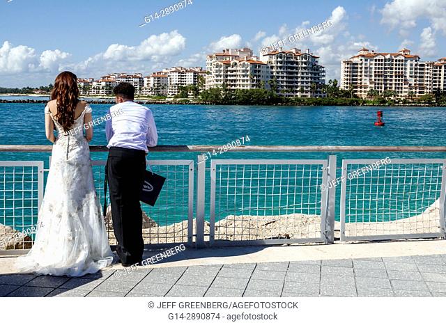 Florida, Miami Beach, South Pointe Park, Government Cut, waterfront, Hispanic, man, woman, couple, wedding dress, newlyweds, Fisher Island, young adult, teen