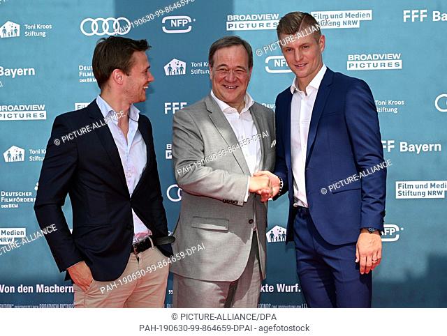30 June 2019, North Rhine-Westphalia, Cologne: Soccer: Premiere of the documentary ""Kroos"". NRW Prime Minister Armin Laschet (m)
