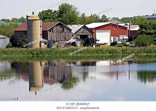 Old farm reflected