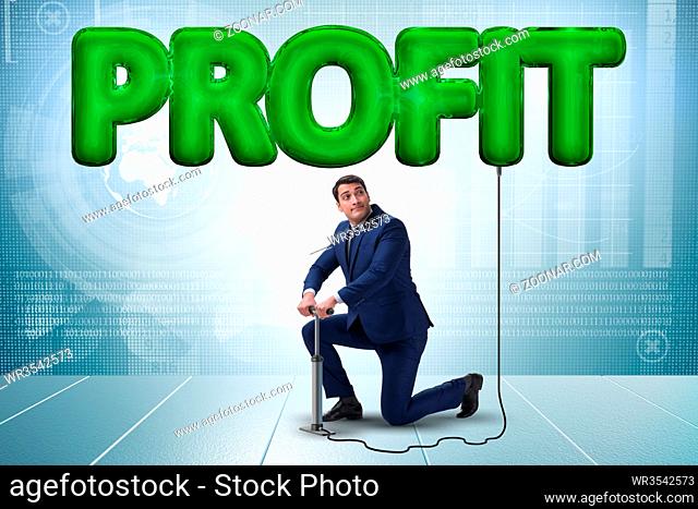 Businessman pumping profit in business concept