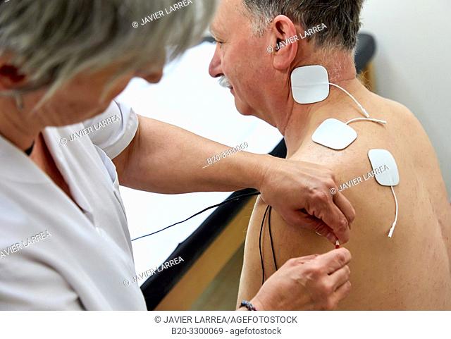 physiotherapist with patient, electro stimulation, Rehabilitation, Amara Berri Health Center building, Donostia, San Sebastian, Gipuzkoa, Basque Country, Spain