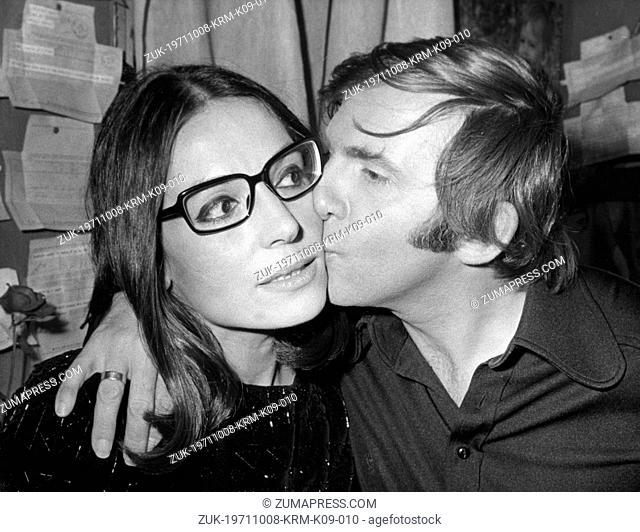 Oct. 8, 1971 - Paris, France - Singer NANA MOUSKOURI gets a kiss on the cheek from from a friend after a performance at the Olympia Theatre