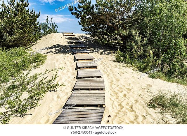 Steps to the up to 60 meter high dune in Nida. Nida (Nidden) is a village on the Curonian Spit to the Baltic Sea. The village is located on the lagoon side of...