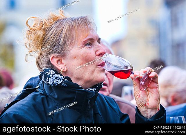 People taste first glasess of St Martin's Wine which started to be offered in Brno, Czech Republic, November 11, 2023. According to tradition