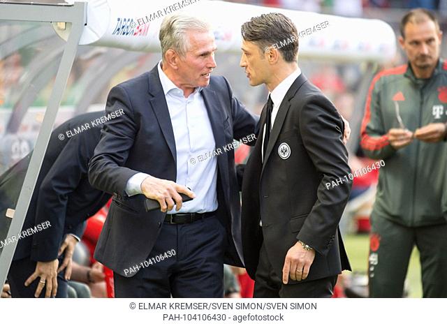 Coach Jupp HEYNCKES (left, M) and coach Niko KOVAC (F) talk to each other shortly before the start of the game, talking, half figure, half figure