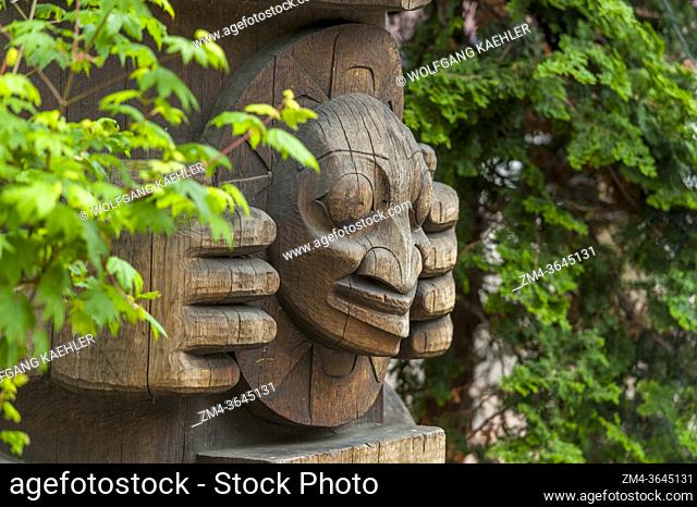The detail of a totem pole (1980s) by Duane Pasco in Occidental Park in Seattle in Washington State, USA
