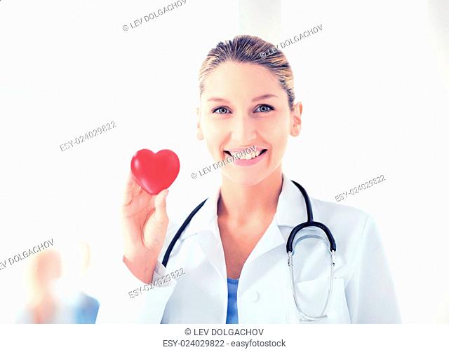 bright picture of female doctor with heart