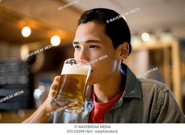 Man having beer in a restaurant