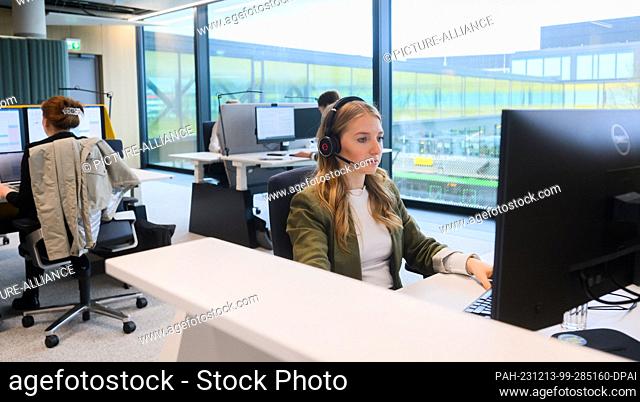 13 December 2023, Lower Saxony, Hanover: employees work at Continental's new corporate headquarters. After several years of construction