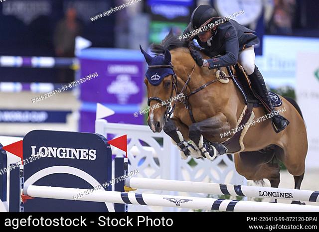 10 April 2022, Saxony, Leipzig: Harrie Smolders from the Netherlands rides Monaco in the final of the Longines Fei Jumping World Cup at the Leipzig Fair