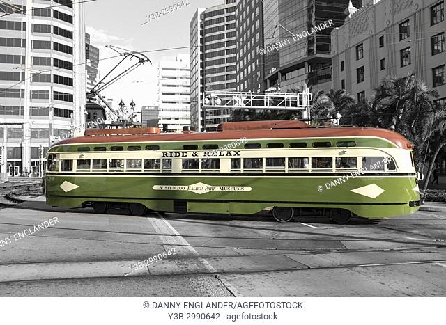 Vintage trolley riding in downtown San Diego, California
