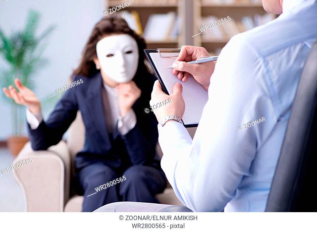 Woman with mask during psychologist visit