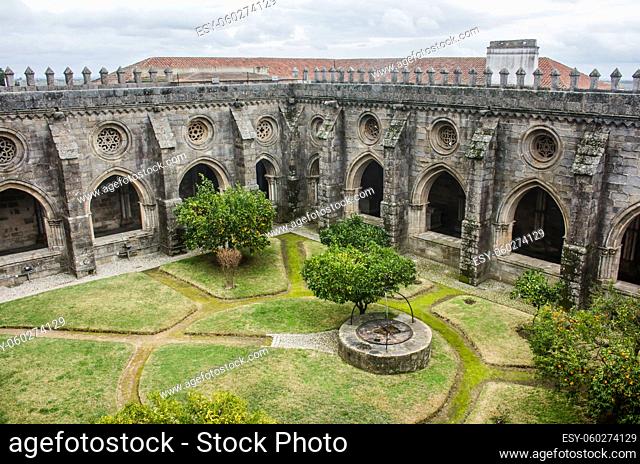 Horizontal photo of a view of the lovely cloister garden from the upper storey of the Cathedral of Evora, in Portugal