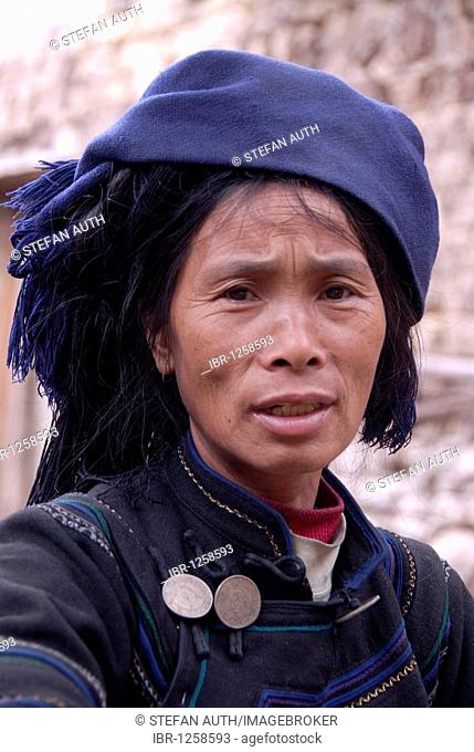Portrait, ethnology, woman of the Hani ethnic group, dark clothes, near Xinji, Yuanyang, Yunnan Province, People's Republic of China, Asia