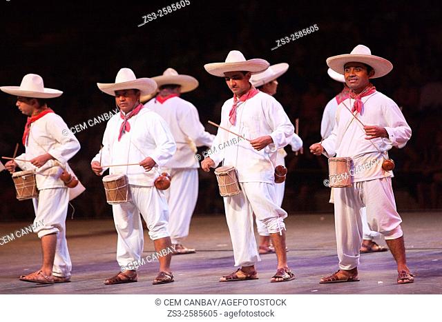 Musicians-drummers from Tabasco State during a performance at ""Mexico Espectacular""' with traditional dress at the stage, Xcaret, Playa del Carmen