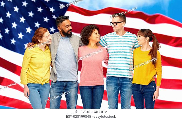 diversity, race, ethnicity and people concept - international group of happy smiling men and women over american flag background