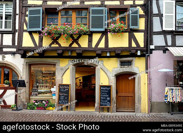 France, Alsace, Alsace wine route, Colmar, old town, half-timbered house, shop, bakery, pastry shop, biscuit production, outside
