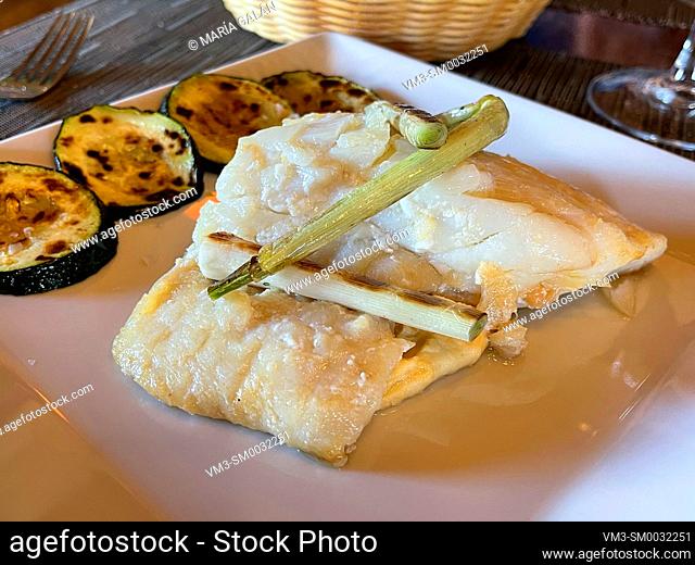 Grilled cod loin with vegetables. Spain