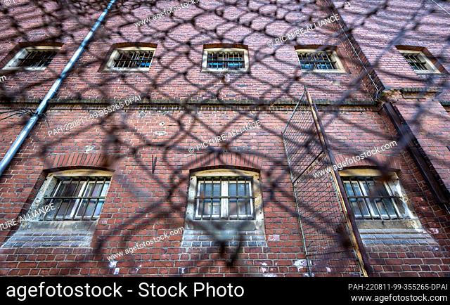 11 August 2022, Saxony, Stollberg: The windows of the former women's prison Schloss Hoheneck are barred. Hoheneck was once the largest women's prison in the GDR