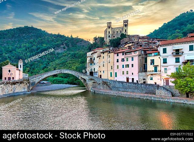DOLCEACQUA, ITALY - CIRCA AUGUST 2020: Dolceacqua panorama with the ancient roman bridge made of stones and the castle