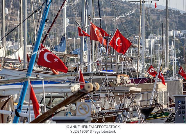 Turkish flags on boats in Bodrum harbour, Turkey