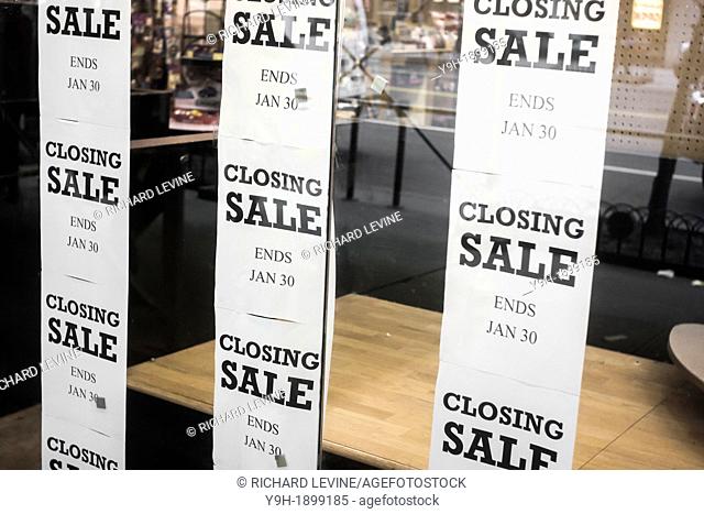 A closing sale is advertised in the Chelsea neighborhood of New York