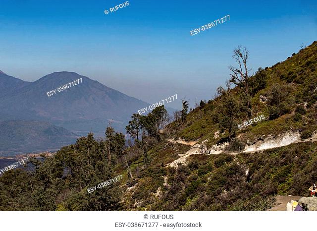 View from the tropical forest with path to the volcano Kawah Ijen, East Java, Indoneisa