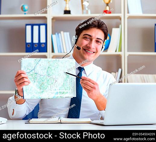 The businessman operator traveling agent working in the office