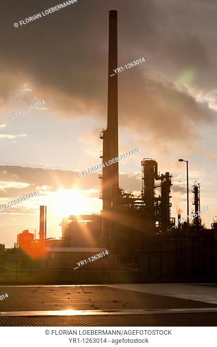 Sunset over an oil refinery in germany