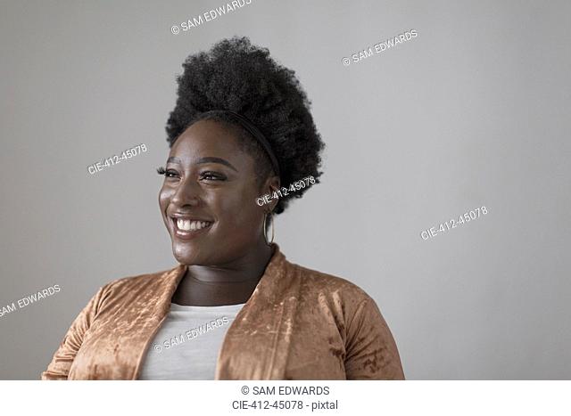 Portrait smiling, confident woman looking away
