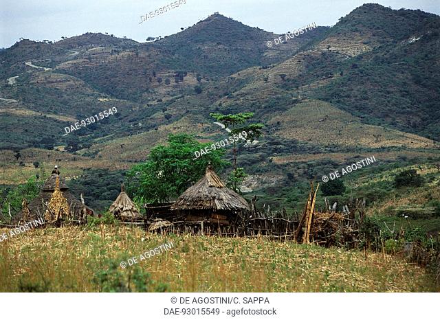 Huts in a Konso village with mountain ranges in the background, near Konso, Ethiopia