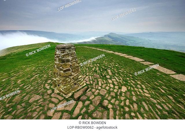 England, Derbyshire, Peak District, A misty morning at the Mam Tor trig point in Derbyshire