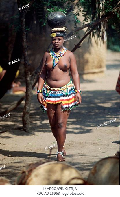 Zulu woman carrying bottle of water, KwaZulu-Natal, South-Africa