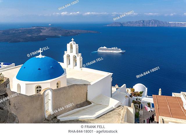 Blue dome and belltower of the church of St. Gerasimos, Firostefani, Fira, Santorini, Cyclades, Greek Islands, Greece, Europe